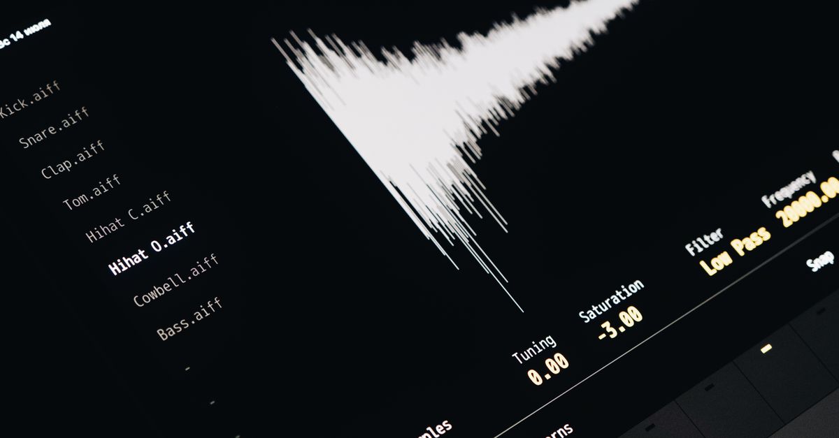 Close-up of a digital audio editing interface displaying sound waves and file names.